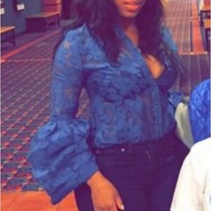 Mesh and floral print top with Roman style sleeves